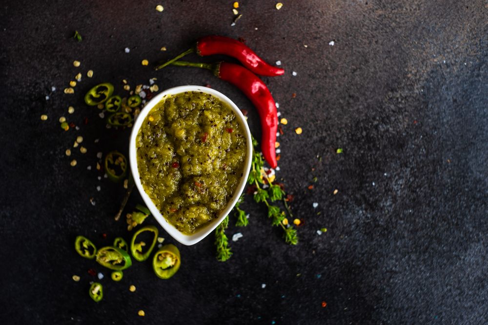 Top view of spicy traditional Georgian satsebeli sauce with copy space
