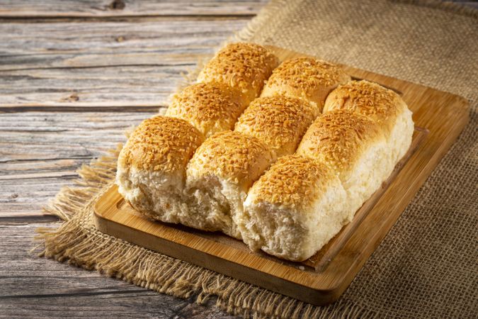 Coconut bread on the wooden table.