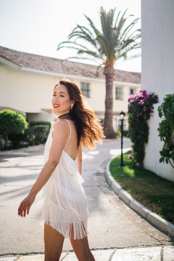 Young elegant Asian woman at a luxurious resort