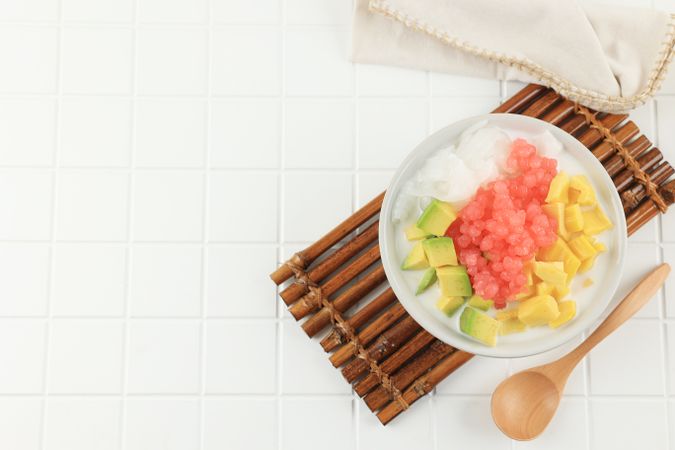 Top View Es Campur or Es Oyen is Mix Fruit with Shaved Ice Served on a Bowl