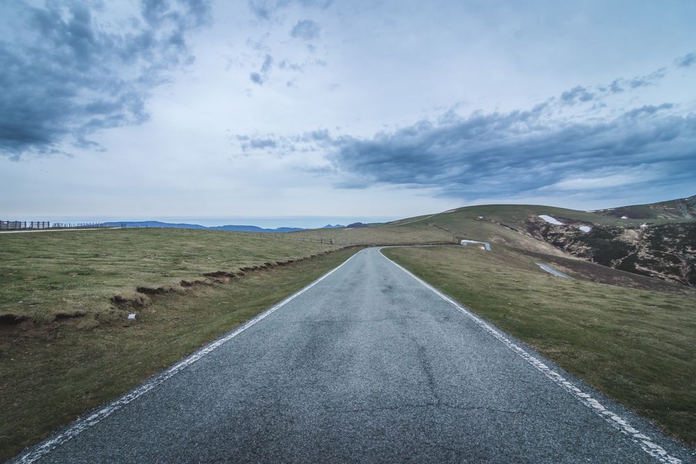 Asphalt road in hilly countryside