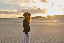 woman on desert nature during sunset