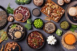 Healthy vegan, plant based protein source and body building food on dark background