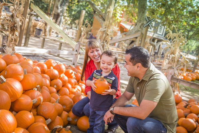 Happy Family at the Pumpkin Patch