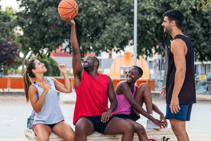 Group of multi-ethnic friends ready to play basketball