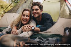 Loving couple relaxing in tent 49mkym