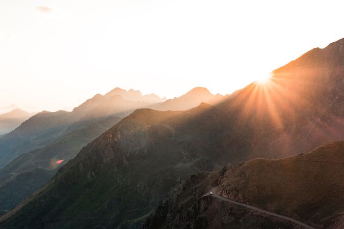 Mysterious mountain high in row in sunlight