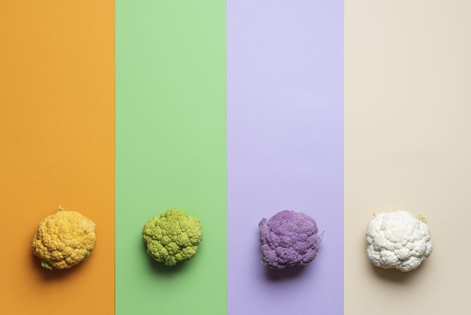 Variety cauliflower on multi-colored background