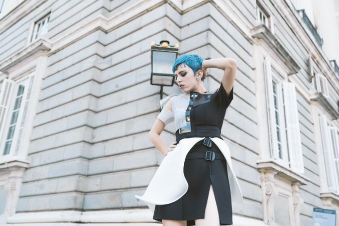 Expressive model in alternative dress on street