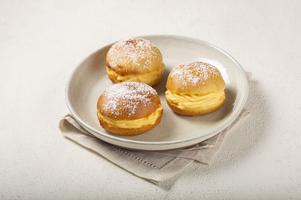 Berlin balls. Bread stuffed with icing cream.