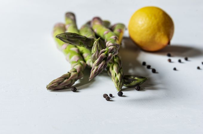 Asparagus with lemon and pepper close up