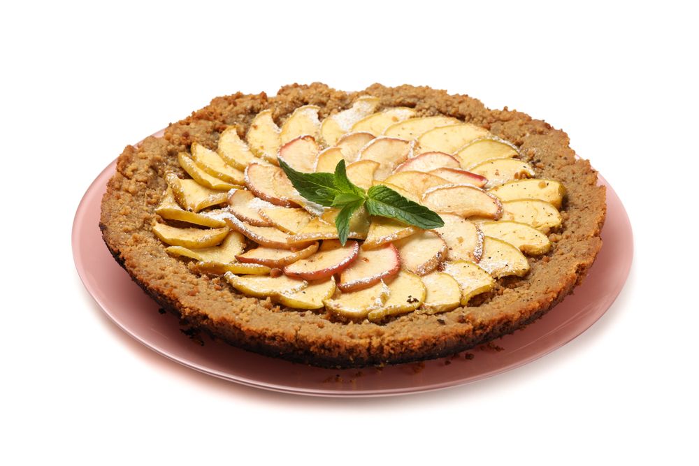 Plate with tasty apple pie isolated on blank background