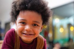 Cute boy smiling at camera
