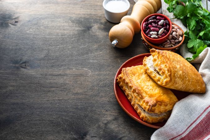 Traditional Georgian lobiani pie with beans and herbs with copy space