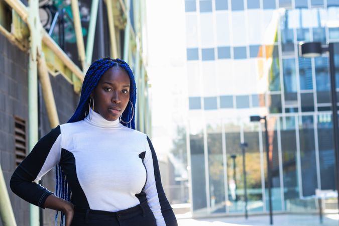 Thoughtful Black woman on street
