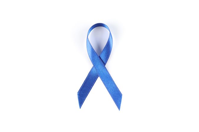 Blue awareness ribbon isolated on blank background