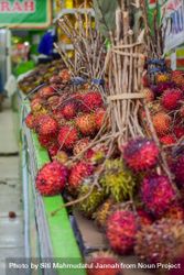 Bunch of lychee fruits for sale in market 47mewk