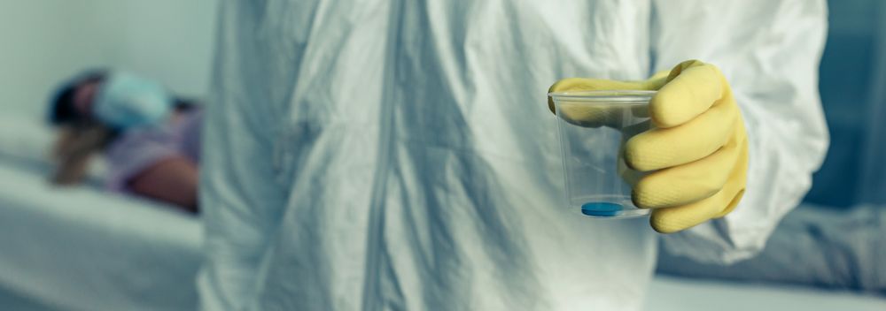 Doctor with medication for a patient