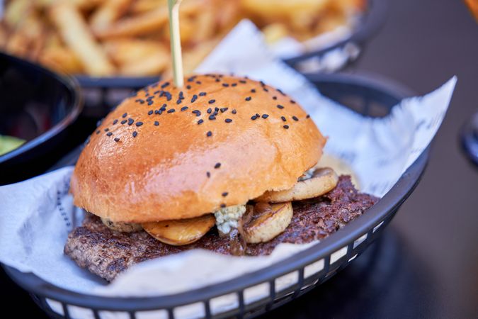 Delicious hamburger with French fries
