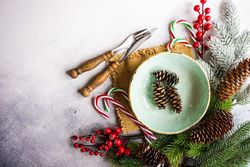 Top view of pine cones in green wintry plate