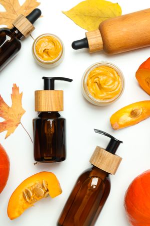 Concept of different cosmetic products, Pumpkin cosmetics, top view