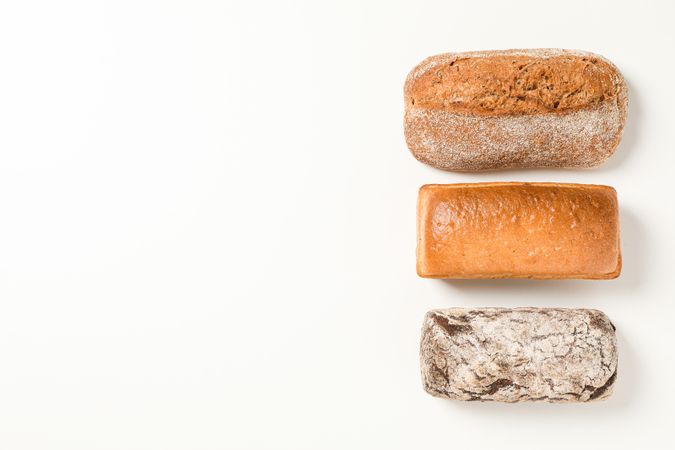 Flat lay composition with bakery products on blank background, space for text