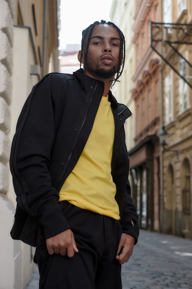 Black male standing on the street