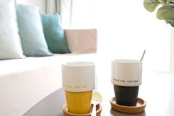 Coffee cups on table at home