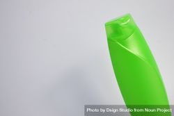 Green shampoo bottle with no labels in studio shoot 5qkkWp