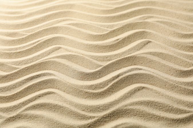 Dry sea sand with waves. Background. Summer. Vacation