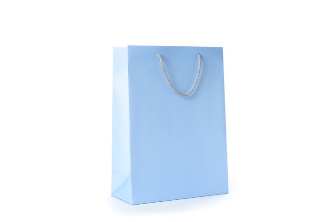 Blue paper bag isolated on blank background