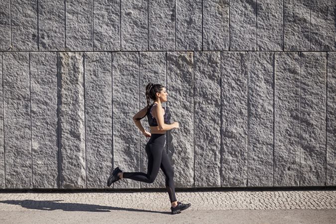 brunette woman running