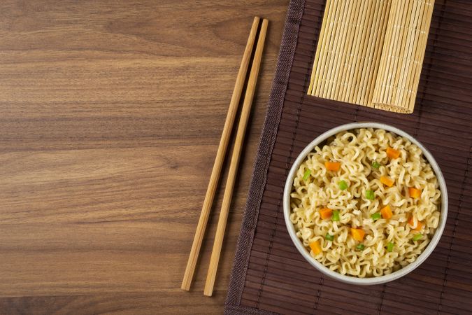 Bowl with instant noodles on the table.