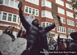 London, England, United Kingdom - June 6th, 2020: Man with arms outstretched and sign at BLM protest 5r9AM0
