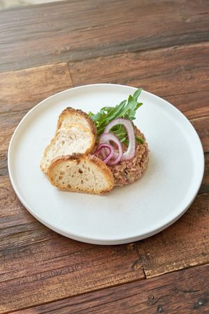 Delicious steak tartare on white plate