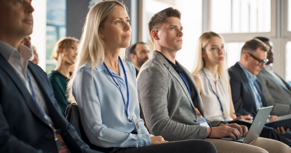 Young Female Psychologist Attending an International Cognitive Behavioral Therapy Seminar.