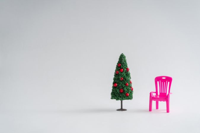 Christmas tree with pink chair