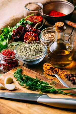 Spices and oil near knife