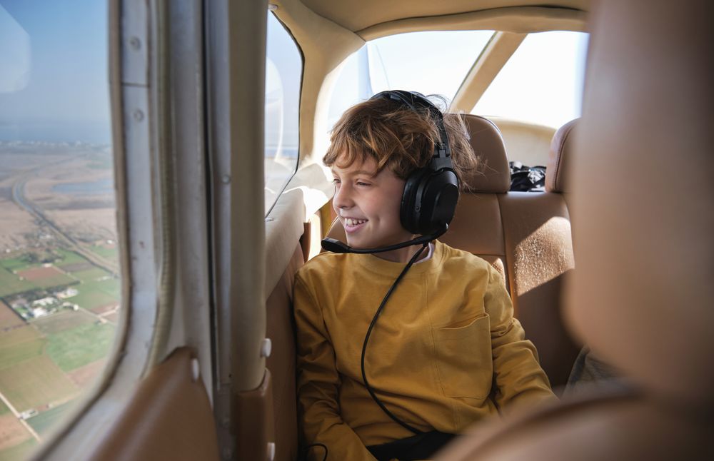 Happy Kid During Aircraft Ride