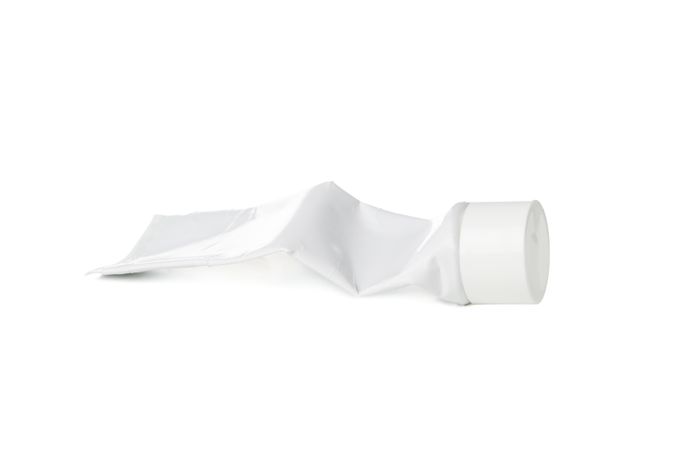 tube with toothpaste isolated on light background
