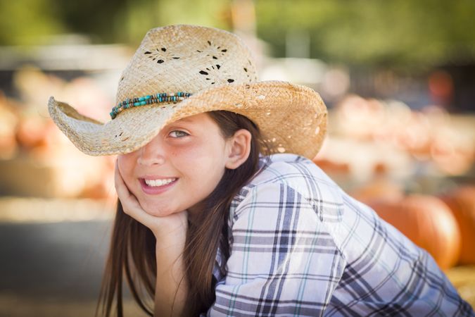 Smiling Preteen Girl Portrait at the Pumpkin Patch