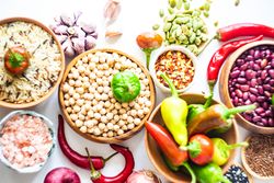 Bowls of dried beans and peppers for chilli