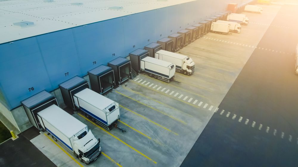 Trucks Efficiently Line up at a Modern Warehouse Loading Dock