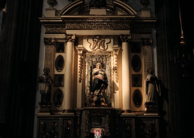 Madonna and child between pillars in Catholic church