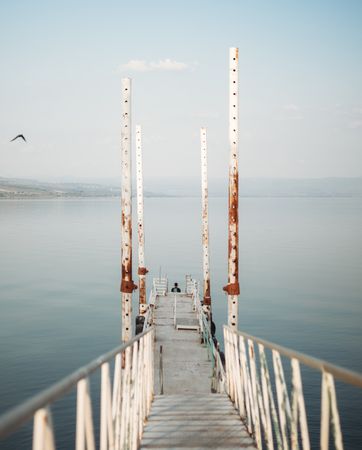 Rusty pier near calm sea