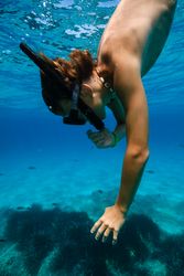 Boy exploring seabed while snorkeling