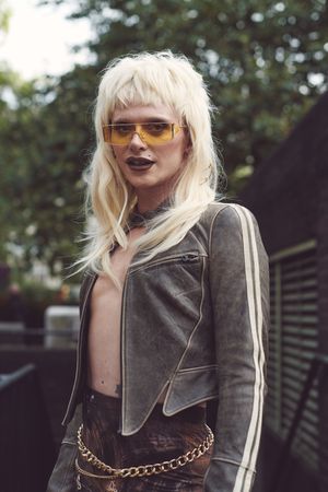 London, England, United Kingdom - September 18 2021: Person in blond wig, biker jacket, chain belt