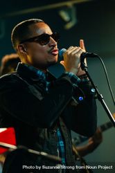 Los Angeles, CA, USA - September 15th, 2014: Man in sunglasses performing on stage 4d9vEb
