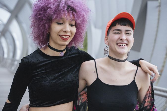 Woman walking together and laughing