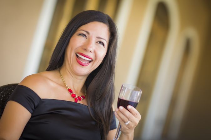 Woman Portrait Outside Enjoying Wine